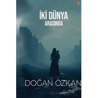 İki Dünya Arasında - Doğan Özkan - Cinius Yayınları